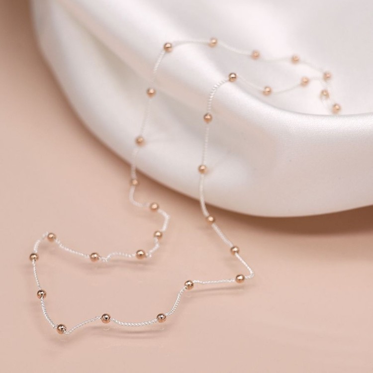Sterling silver chain and rose gold bead necklace