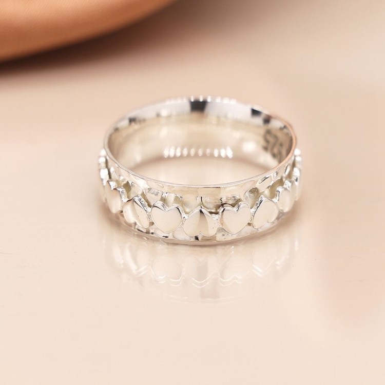 Sterling silver spinning ring with multi heart band
